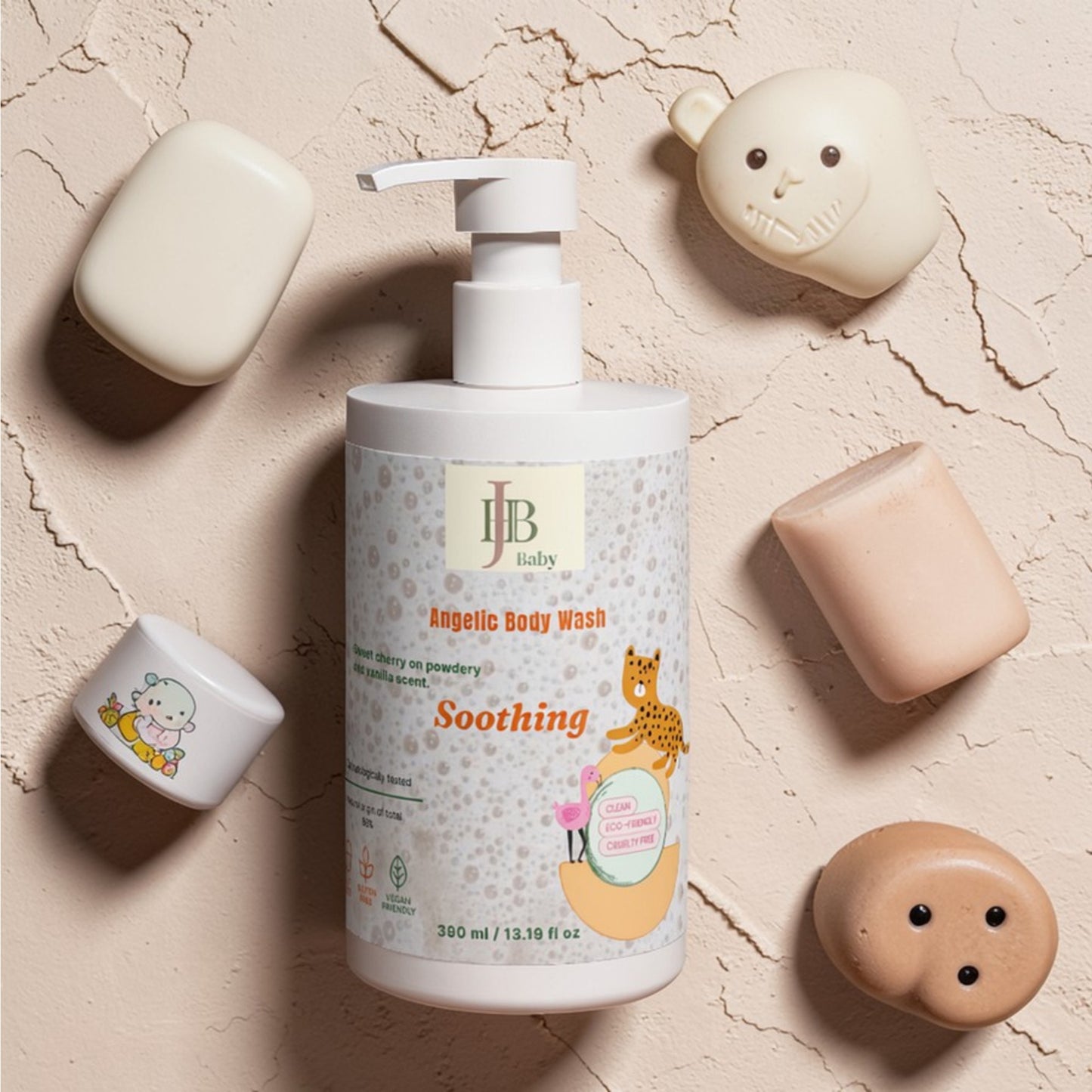 Baby body wash bottle with pump on a textured beige background