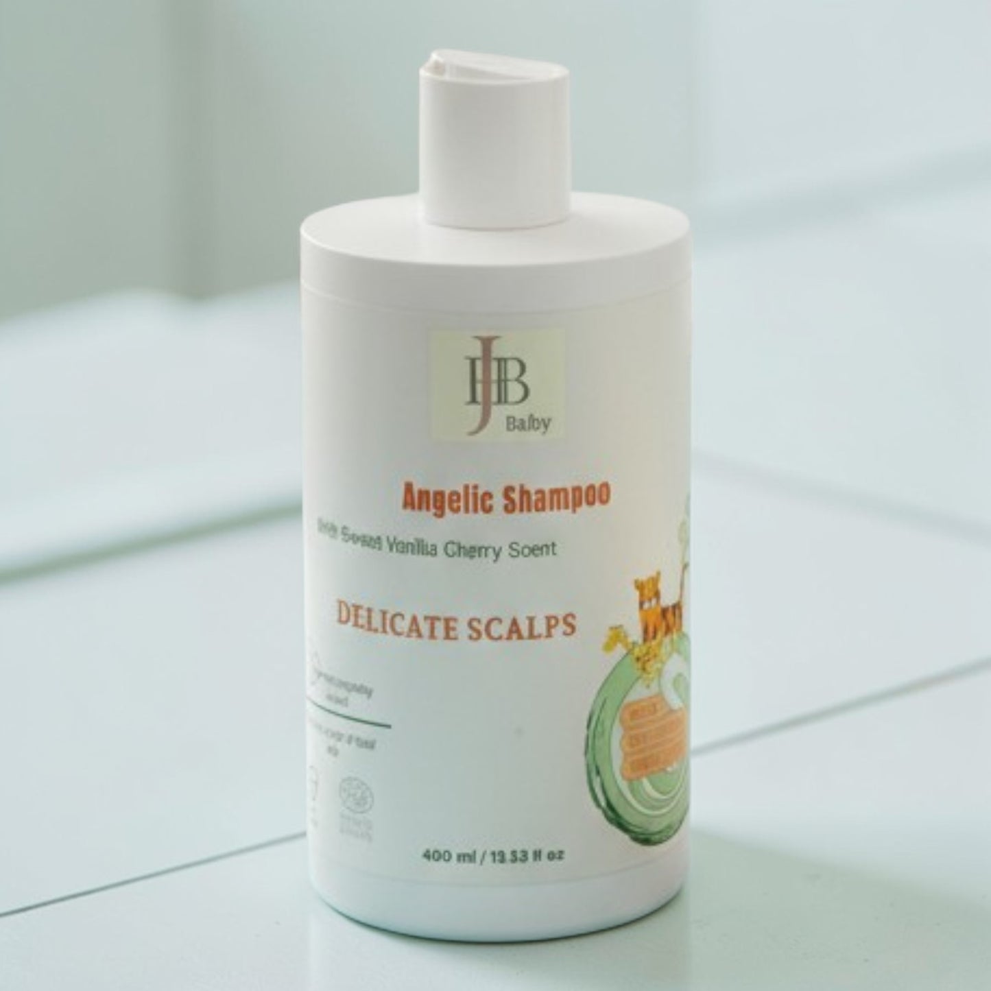Baby shampoo bottle with 'JJB Baby' branding on a light surface
