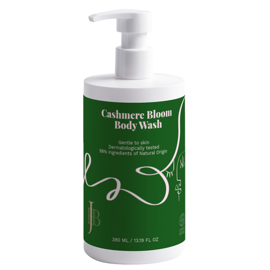 Cashmere Bloom body wash bottle with green label on a white background