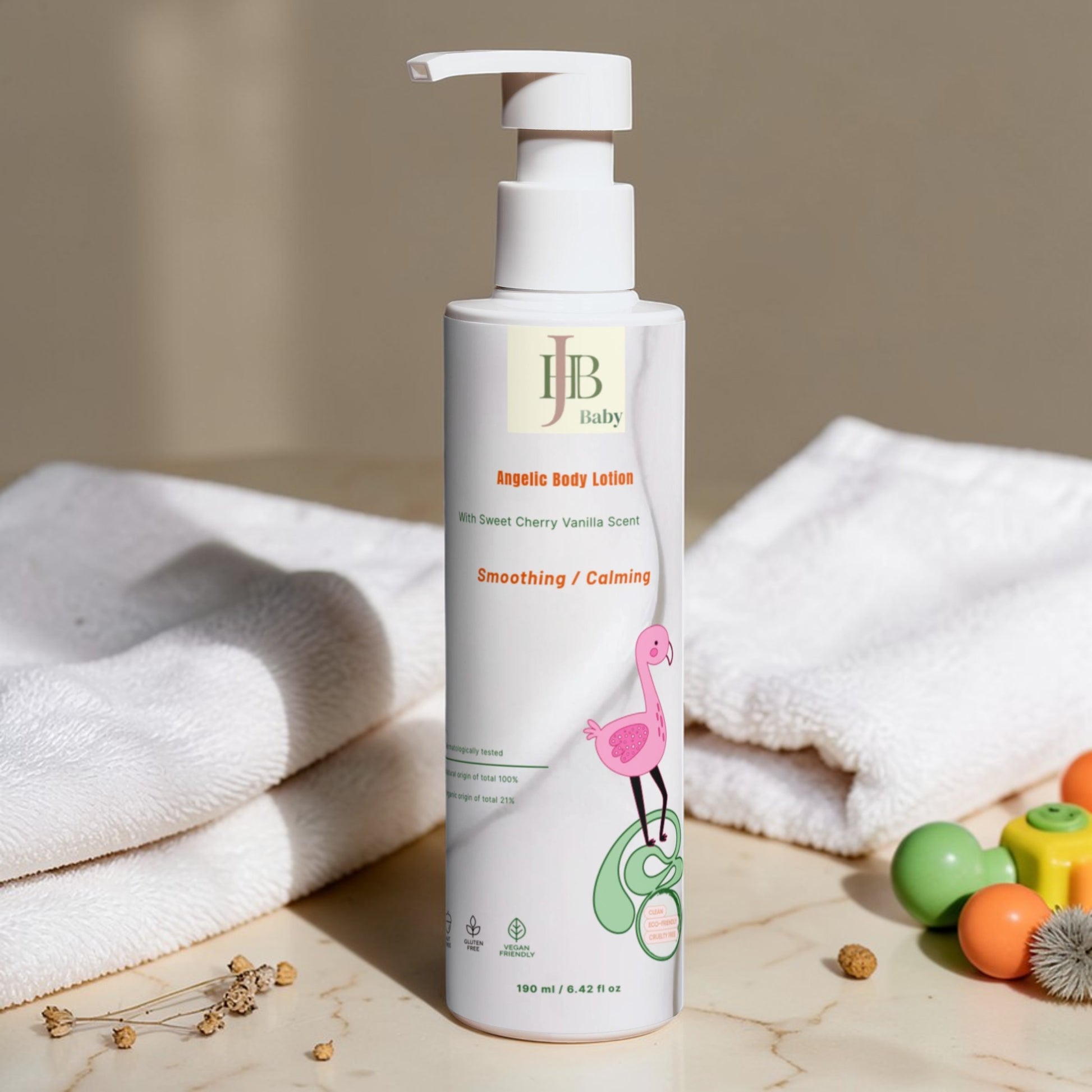 JB Baby lotion bottle with pump on a neutral background