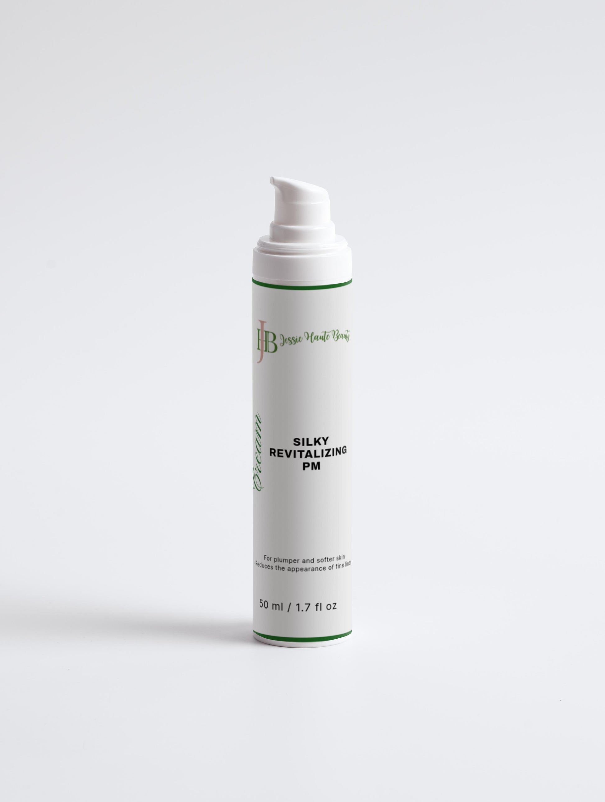 Silky Revitalizing PM Cream, white bottle, is an anti-aging formula.
