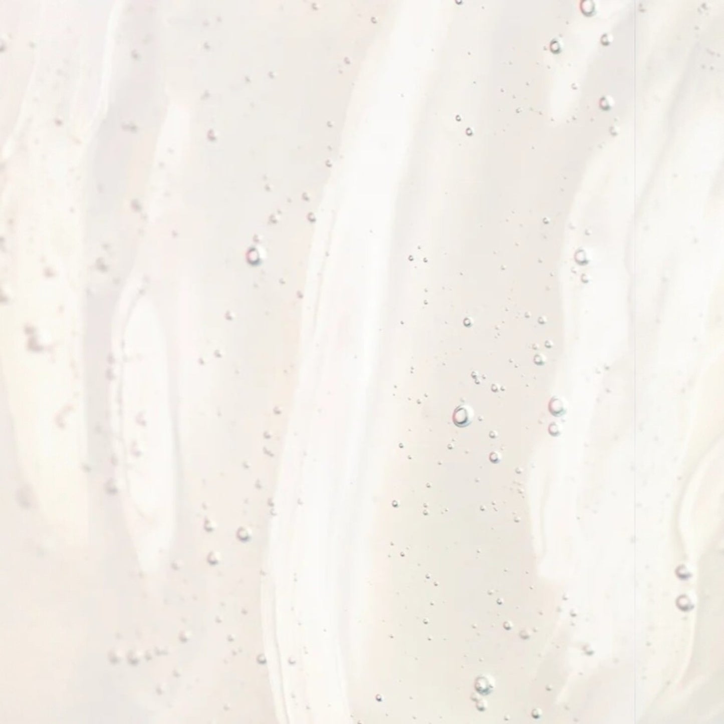 Close-up of a textured white surface with small specks